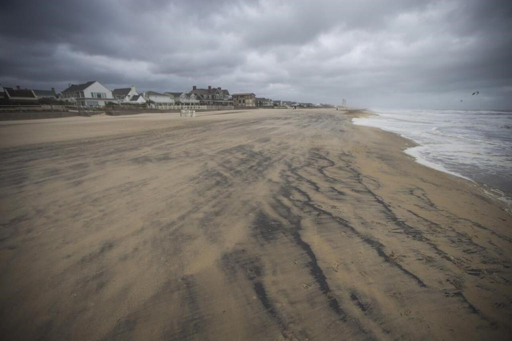 Southern East Coast hit by flooding as Ophelia weakens to tropical  depression and moves north –