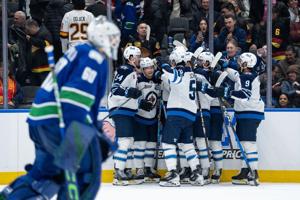 Perfetti nets OT winner to lift Jets past Canucks 3-2