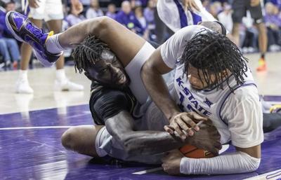 Kansas State routs UCF 77-52 in the Knights' Big 12 Conference inaugural