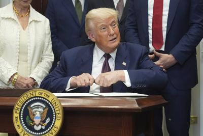The Latest: Trump signs order for more tariffs on US partners to go into effect in 7 days