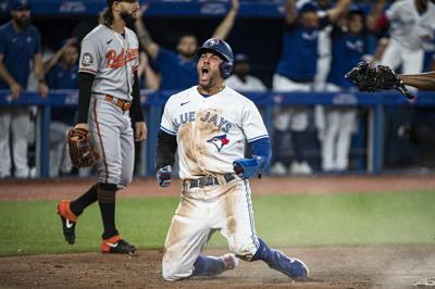 TORONTO, ON - AUGUST 03: Toronto Blue Jays Right field George Springer (4)  reacts to a strike out in the first inning during the regular season MLB  game between the Baltimore Orioles
