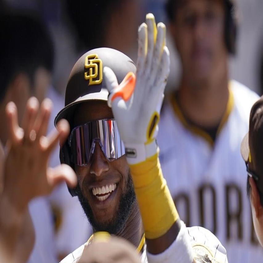 San Diego Padres' Ha-Seong Kim batting during the second inning of a  baseball game against the San Francisco Giants, Friday, July 8, 2022, in  San Diego. (AP Photo/Gregory Bull Stock Photo 