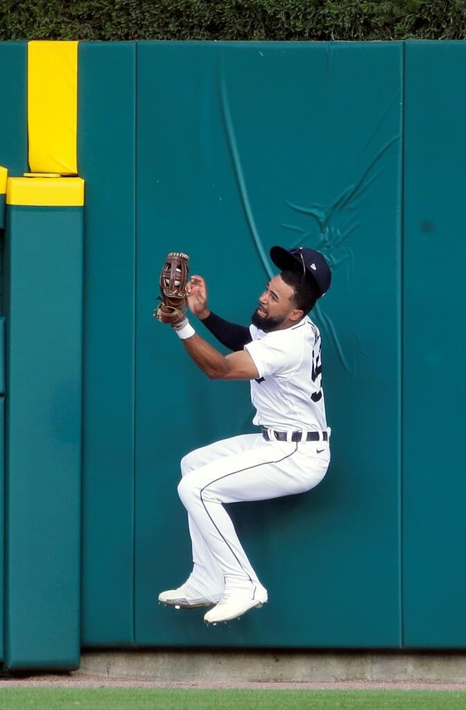 Fraley's catch, single in 11th leads M's over Tigers 9-6