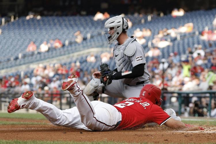 Nathaniel Lowe's 3-run triple helps Nationals past AL-leading Tigers 9-4 for a doubleheader split
