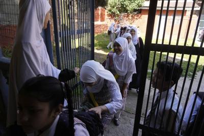 PHOTO COLLECTION: India Pakistan School Reopening