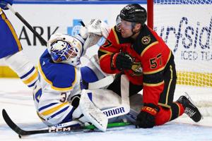 Sabres beat the Senators 8-4 for their first victory of the season.