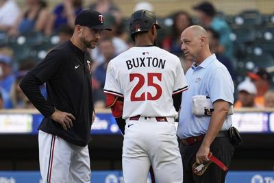 Minnesota Twins beat Chicago Cubs 4-2, but Buxton injures hand