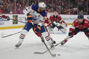Edmonton Oilers deal winger Evander Kane to Vancouver Canucks for fourth-round pick