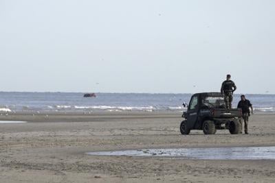 UK authorities detain 1st group of migrants under plan to thwart small boats crossing from France