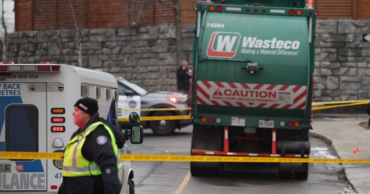 Woman dead after being hit in crosswalk by garbage truck