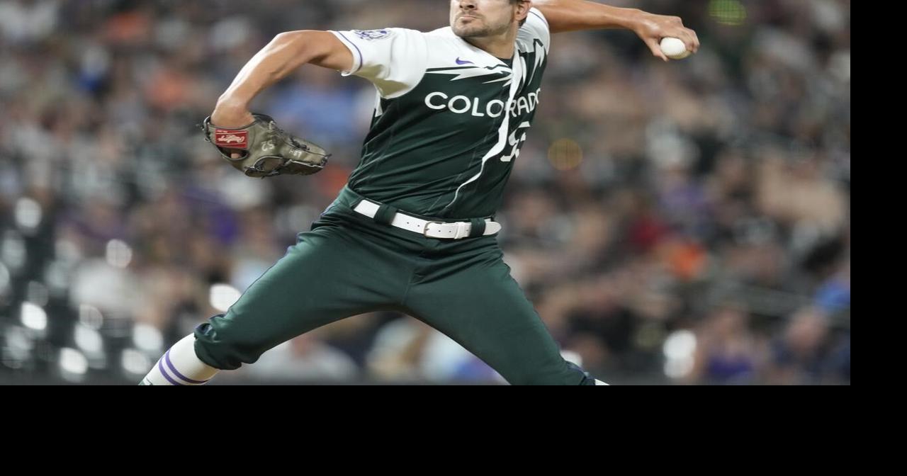 Braves bolster bullpen by acquiring veteran left-hander Hand from Rockies