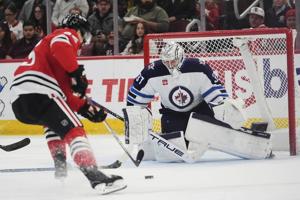 Connor stars as Jets clinch Central Division title with shootout win over Blackhawks