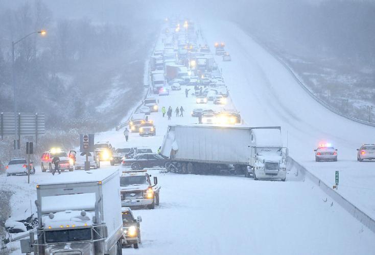 Three in critical condition after giant pileup shuts down Highway 401 ...