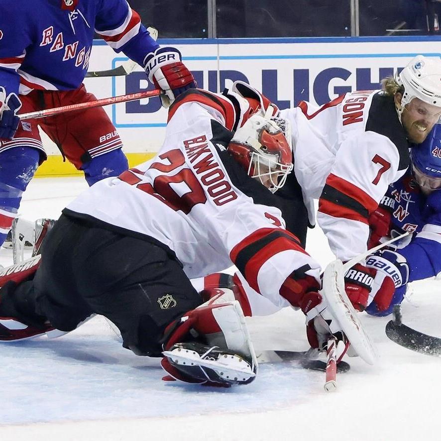 Hughes has 3 points in 2nd period as Devils beat Rangers
