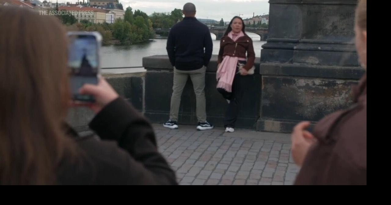 Depeche Mode fans flock to Prague’s Charles Bridge to recreate 1988 band photo