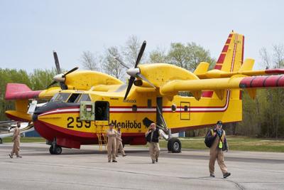 Wildfire forces residents in multiple communities in northern Manitoba to flee