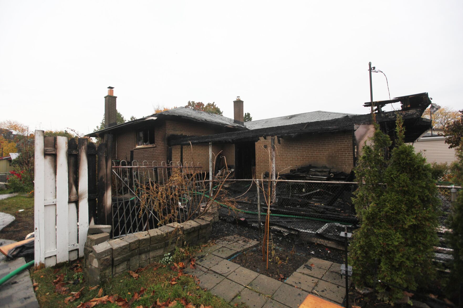 Woman taken to hospital after house fire in Scarborough
