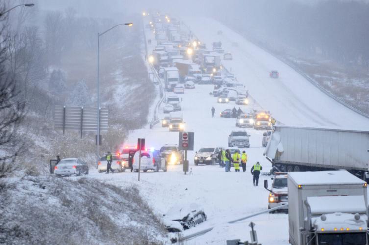 Three in critical condition after giant pileup shuts down Highway 401 ...