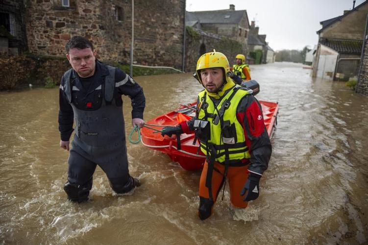 French residents rescued from flooded homes by boat as Storm Herminia ...