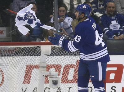 Three fans charged after Maple Leafs jerseys tossed on ice