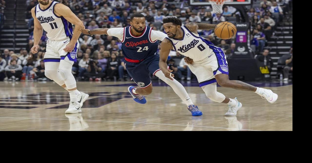 Norman Powell has 31 points and 12 rebounds as the Clippers hold off the Kings 107-98