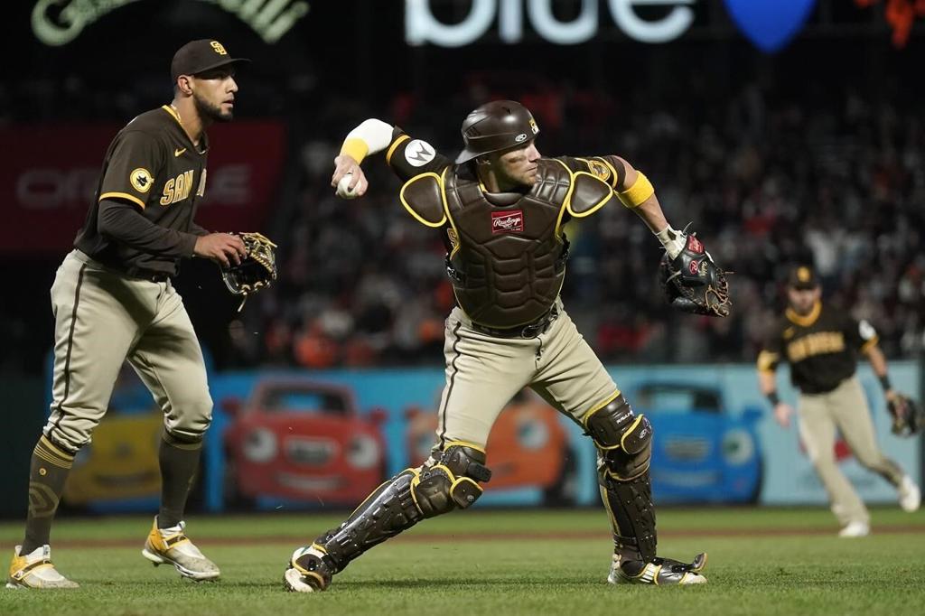 Padres keep playoff hopes alive, beat Giants 5-2 in 10 for 1st extra-inning  win