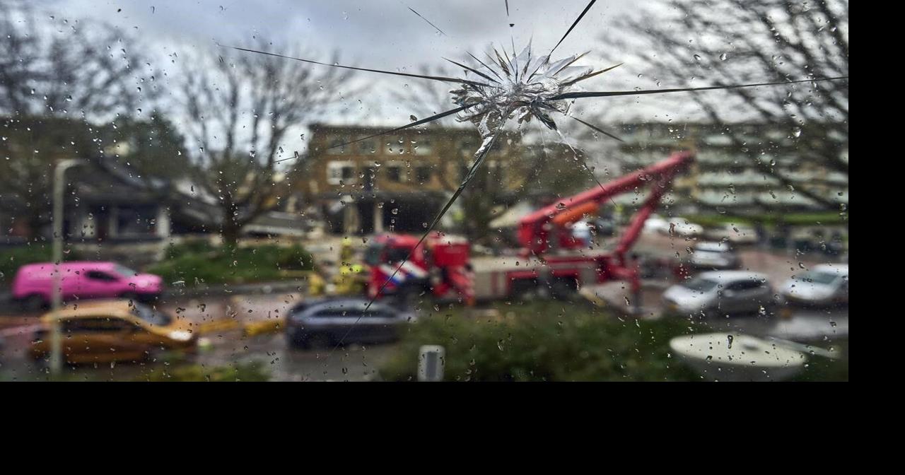 Rescuers search for victims after an explosion at a Dutch apartment ...