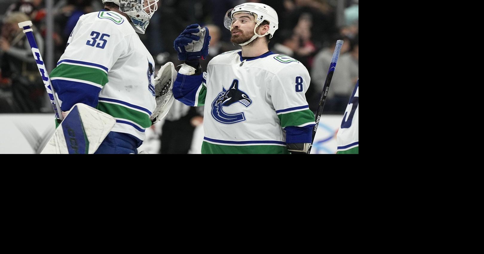 Vancouver Canucks sign goalie Thatcher Demko, winger Conor Garland to extensions
