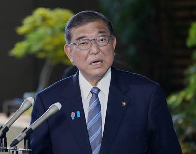 Japan's Ishiba says he will decide on resignation over election loss after studying US tariff deal