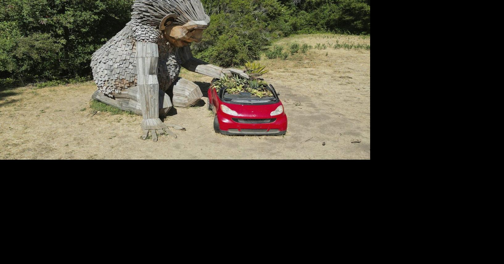 Giant trolls built from trash want to save humans from themselves