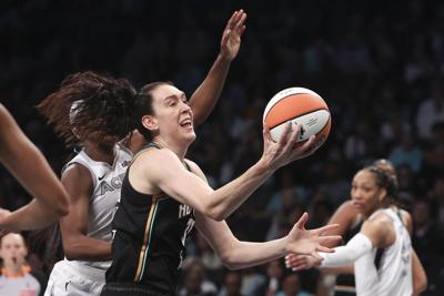 Liberty raise championship banner, beat Aces 92-78