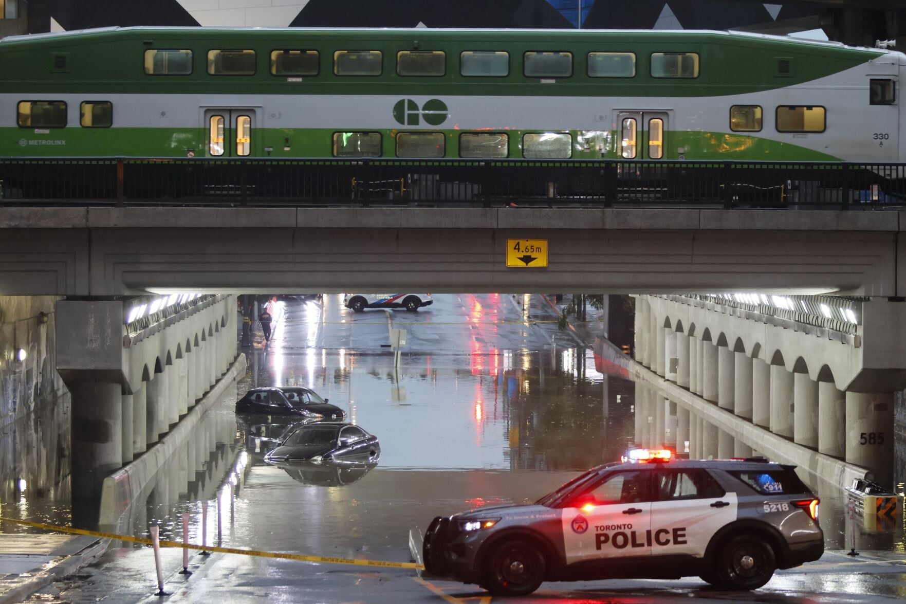 Toronto cleans up after ferocious storm floods streets, downs trees, and leaves 25,000 without power; DVP remains closed indefinitely
