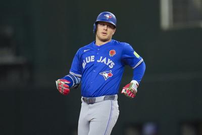 Blue Jays put OF Varsho on 10-day IL with left hamstring strain, activate RHP Swanson