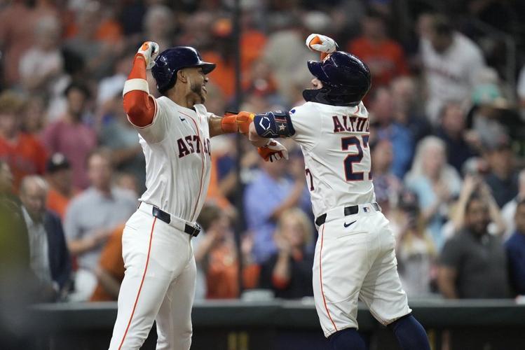 Altuve has 4 hits, 2 home runs, Astros win 11-1 and send A's to 12th loss in 13 games.