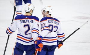 Oilers keep rolling with 4-2 victory over reeling Flames