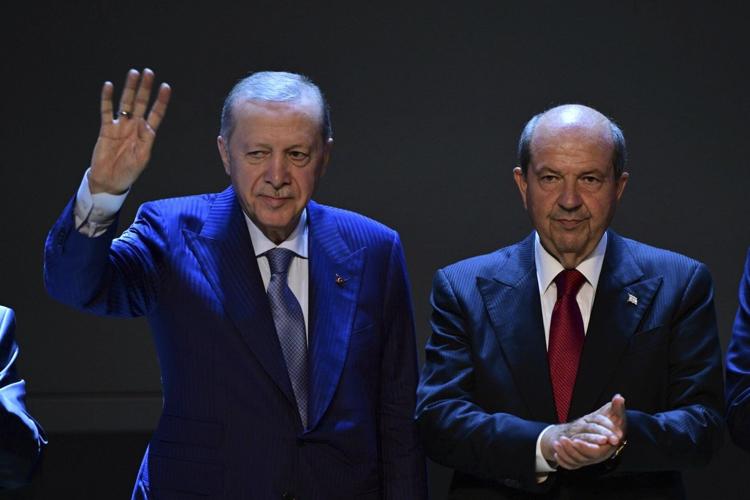 Turkey's president says his support for a two-state deal on ethnically split Cyprus is absolute