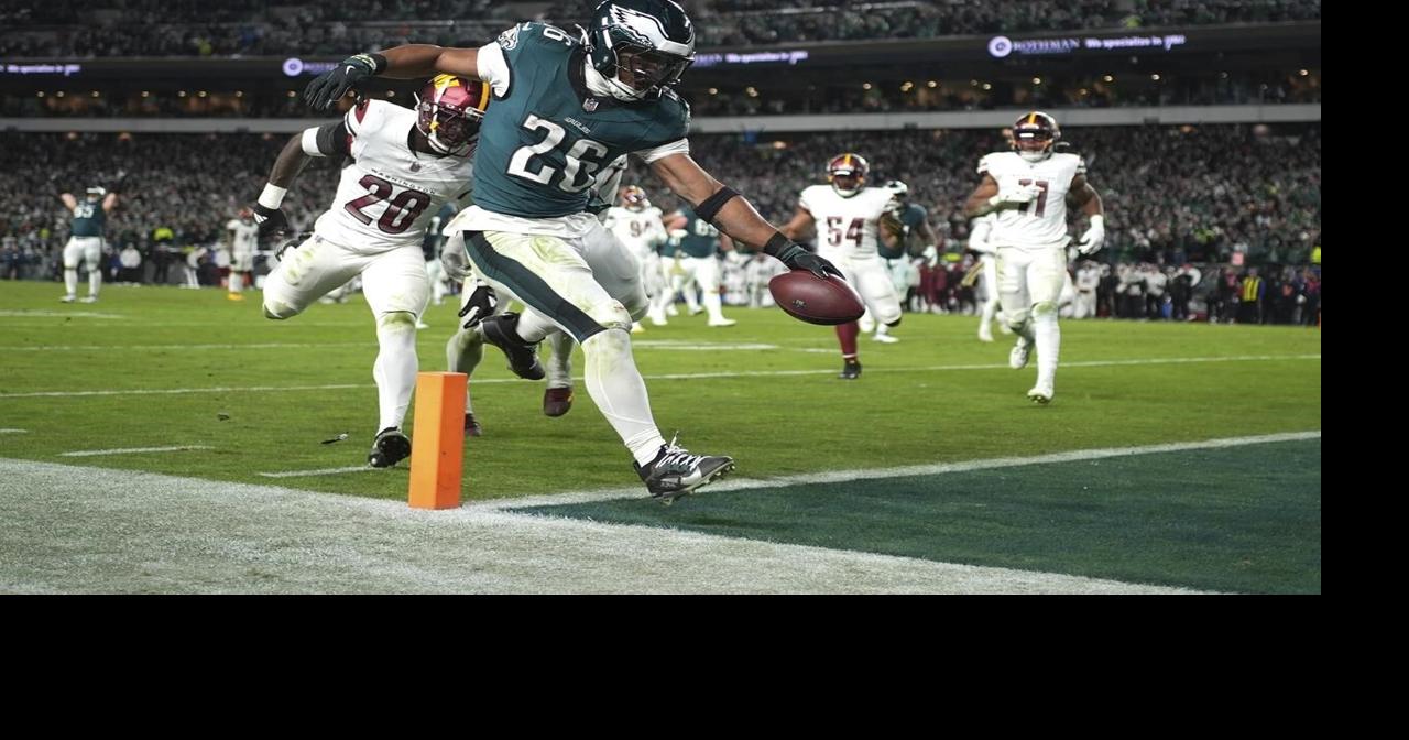Saquon Barkley runs for 2 TDs, Eagles beat Commanders 26-18 to stretch NFC East lead