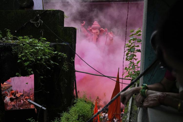 Photos show Indians marking final day of Ganesh Chaturthi that ends with sea immersion