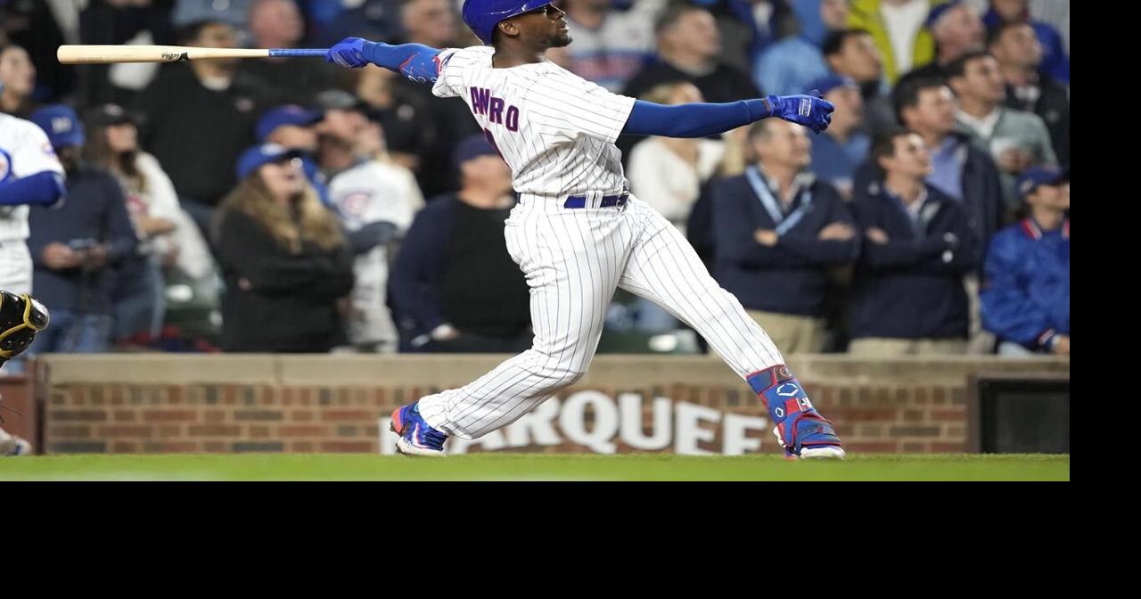 Canario's grand slam helps Cubs rout Pirates 14-1 to open half-game lead for last wild card