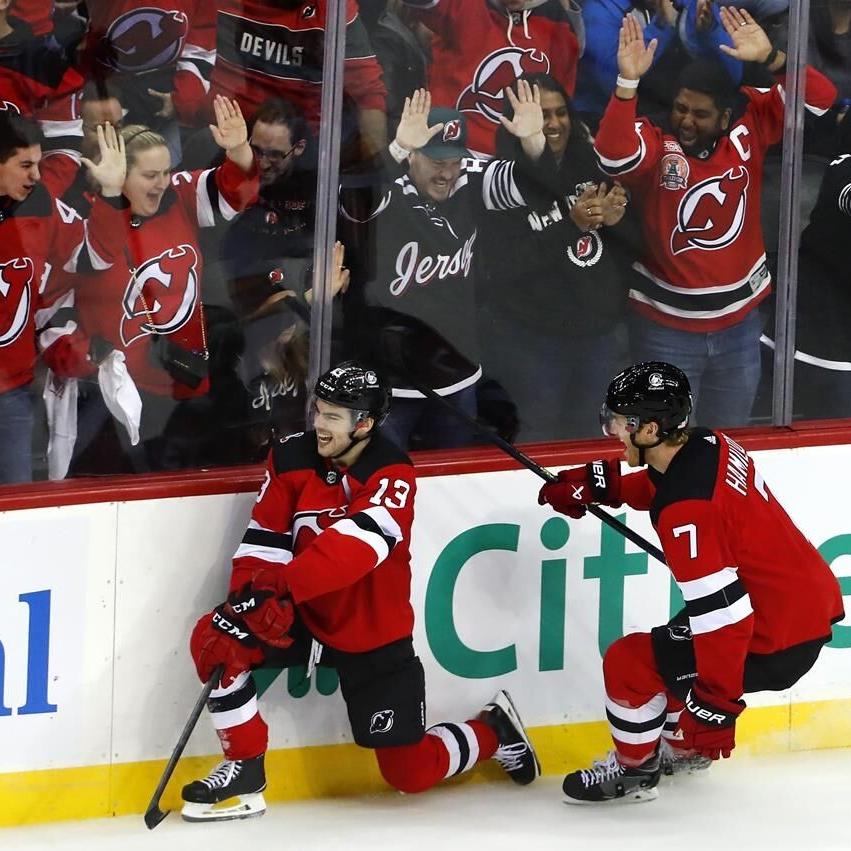 Ottawa Senators right wing Claude Giroux (28) and New Jersey Devils left  wing Erik Haula (56) fight for the puck during the overtime of an NHL  hockey game, Thursday, Nov. 10, 2022