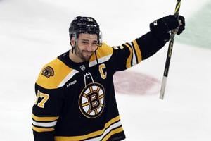 From chords and forehands, ex-Bruins captain Patrice Bergeron happy in retirement