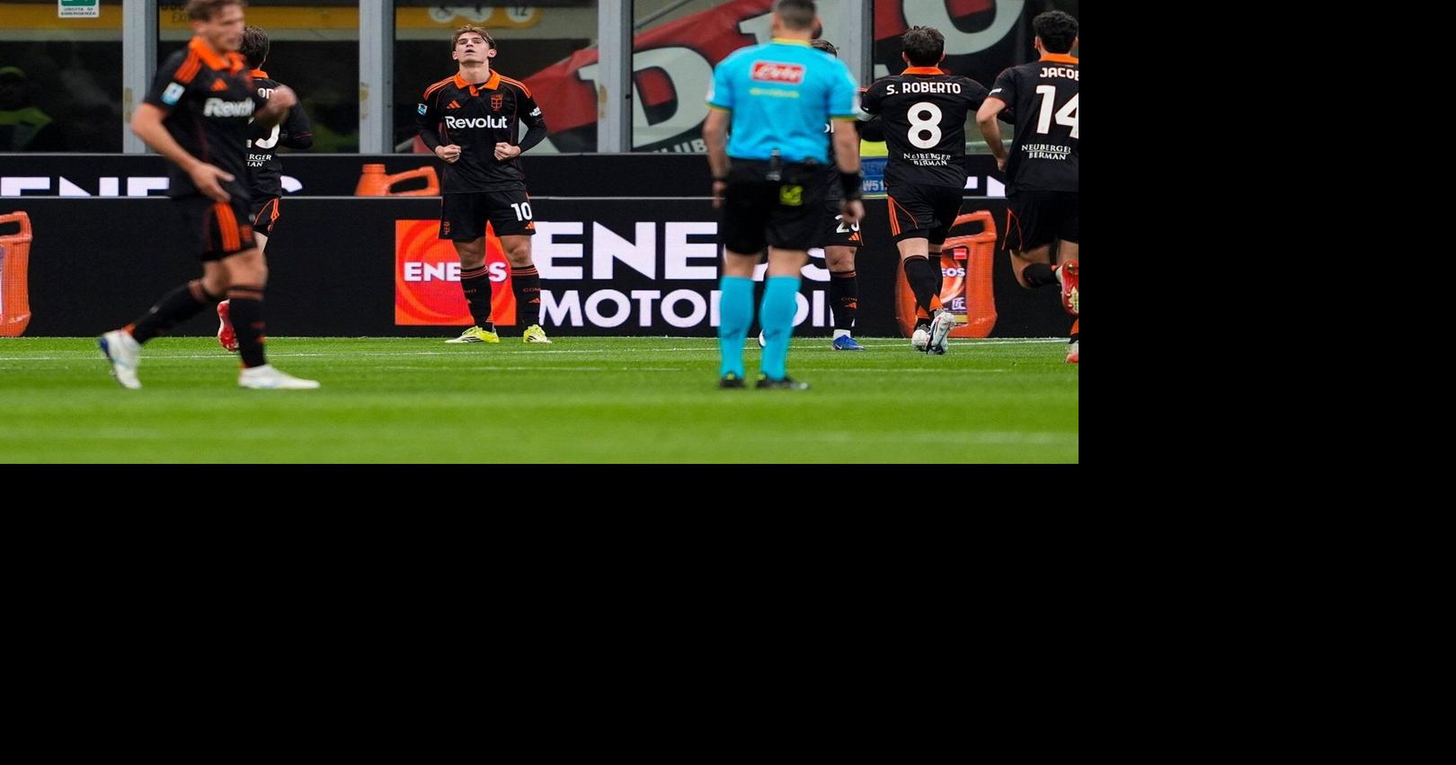 AC Milan falls seven points behind leader Inter in title race after 1-1 home draw with Como