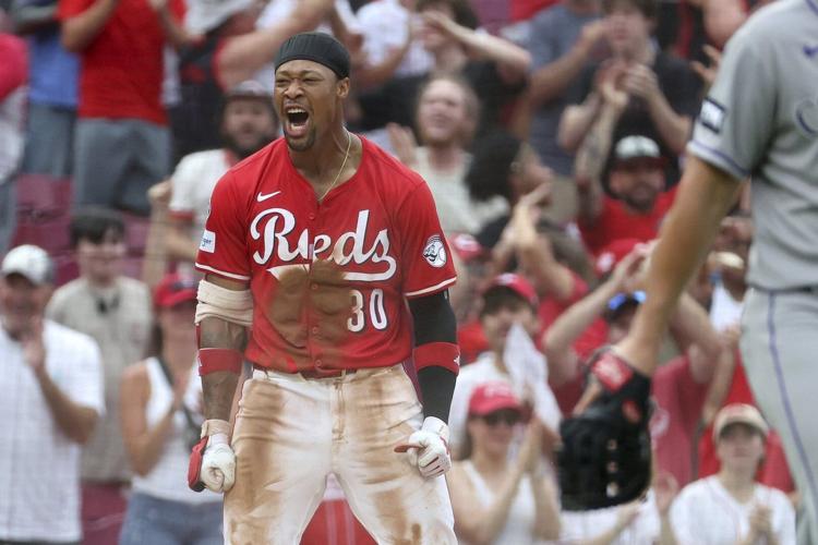 Benson triples and scores on 9th-inning error to left the Reds past the Rockies, 4-3