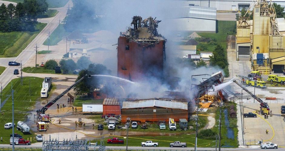An explosion and fire at a Nebraska plant are preventing a search for 3 missing people