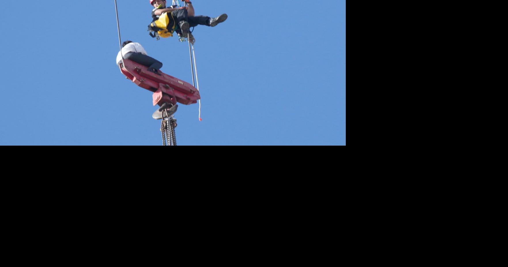 Fire teams rescue 15-year-old stuck on crane over high-rise building in Jerusalem