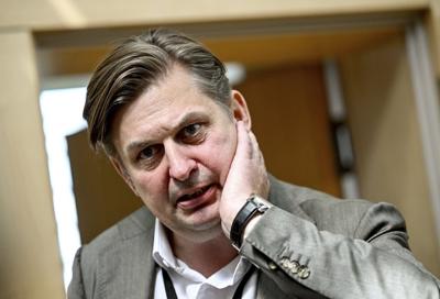 German parliament lifts immunity of a prominent far-right lawmaker and police search his home