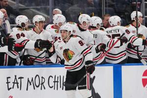 Lardis, Nazar lead Blackhawks past Islanders 4-3, Frondell gets assist in NHL debut
