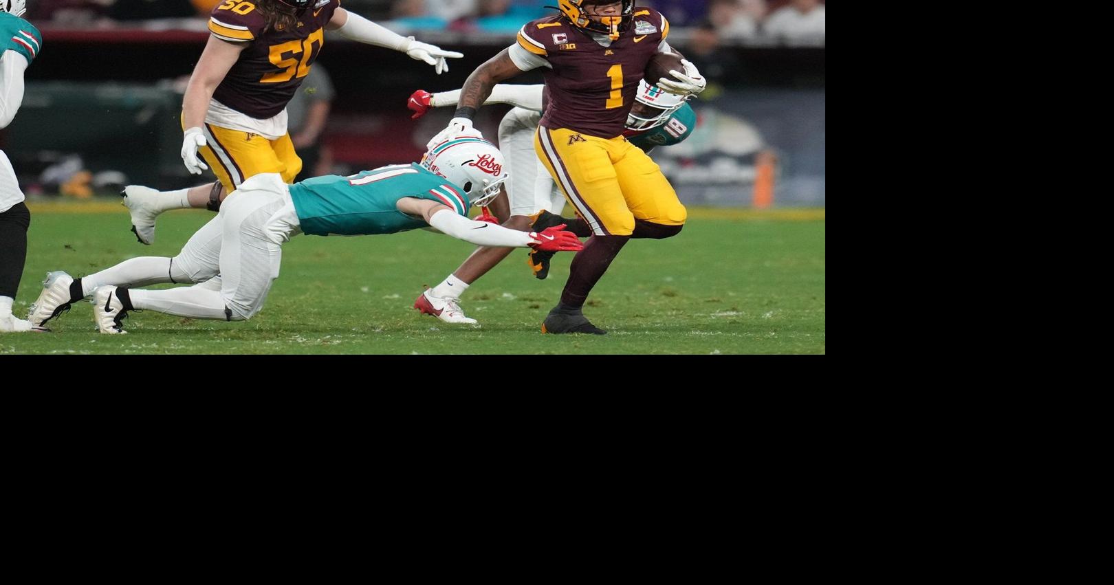 Smith’s diving TD catch in overtime sends Minnesota to 20-17 win over New Mexico in Rate Bowl