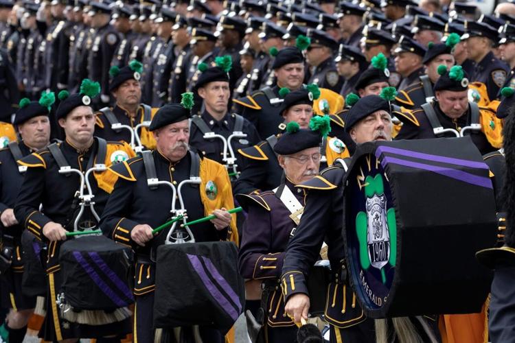 NYPD officer killed by friendly fire is hailed as a hero