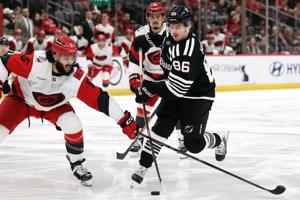 Devils' Jack Hughes leaves game with injury two weeks before U.S. opens play at the Olympics